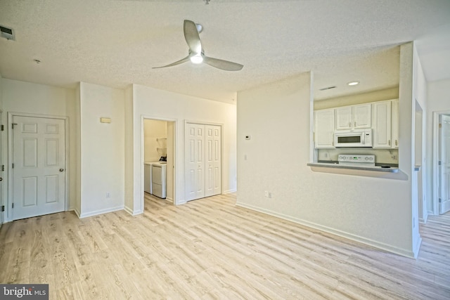 unfurnished living room with light wood-type flooring, a textured ceiling, and ceiling fan