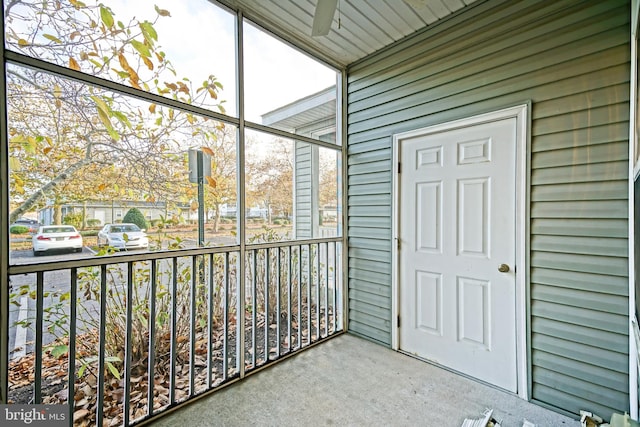 unfurnished sunroom with plenty of natural light