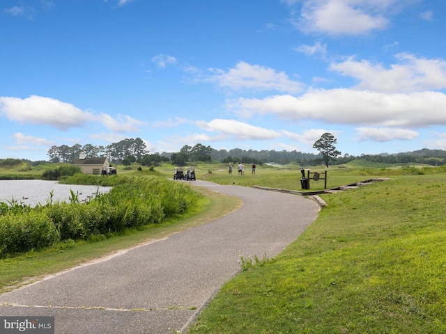 surrounding community with a yard and a rural view