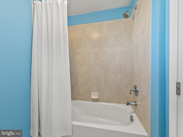 bathroom featuring shower / tub combo