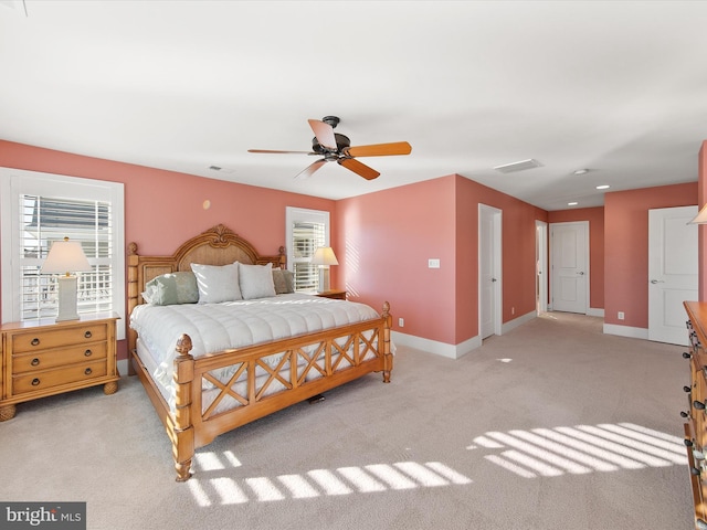 carpeted bedroom featuring ceiling fan