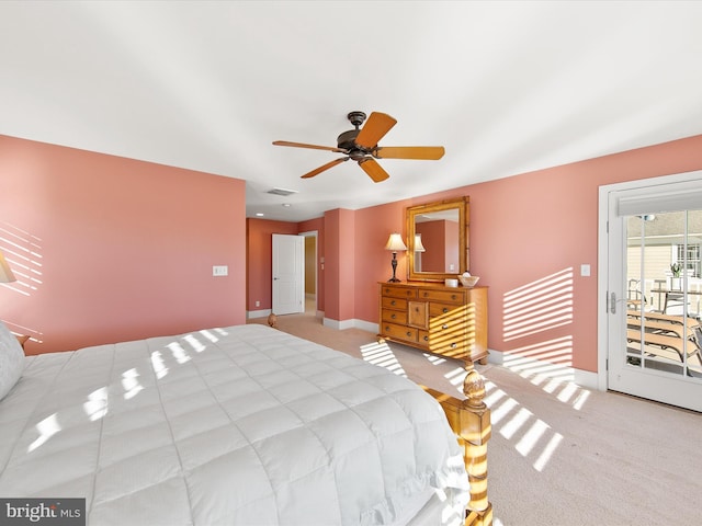 carpeted bedroom featuring access to outside and ceiling fan