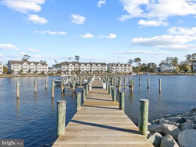 view of dock with a water view