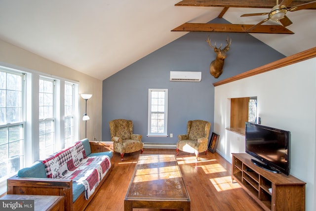 living room with a wall unit AC, a wealth of natural light, beamed ceiling, and light hardwood / wood-style flooring