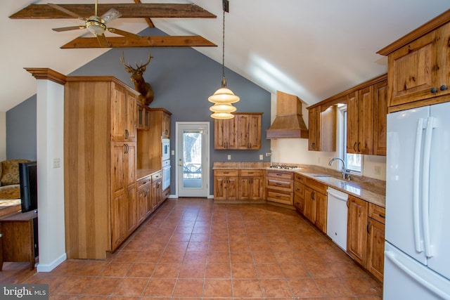 kitchen with premium range hood, vaulted ceiling with beams, pendant lighting, a wealth of natural light, and white appliances