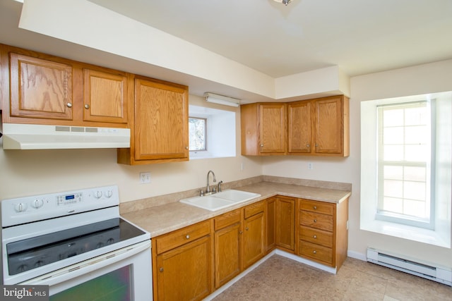 kitchen featuring sink, baseboard heating, and electric range