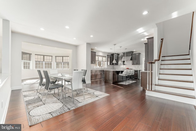 dining room featuring dark hardwood / wood-style floors and sink