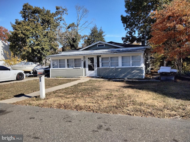 view of front of home with a front yard