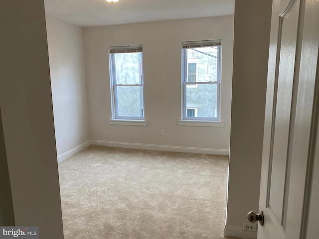 view of carpeted spare room