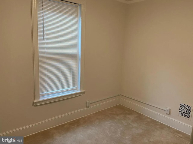 view of carpeted spare room