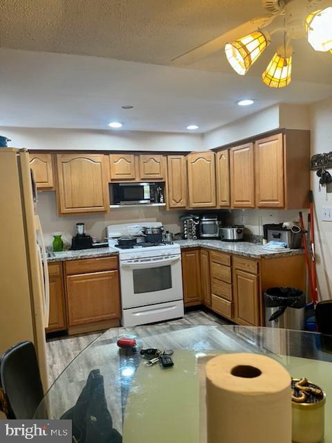 kitchen featuring white appliances