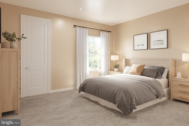 bedroom with light colored carpet