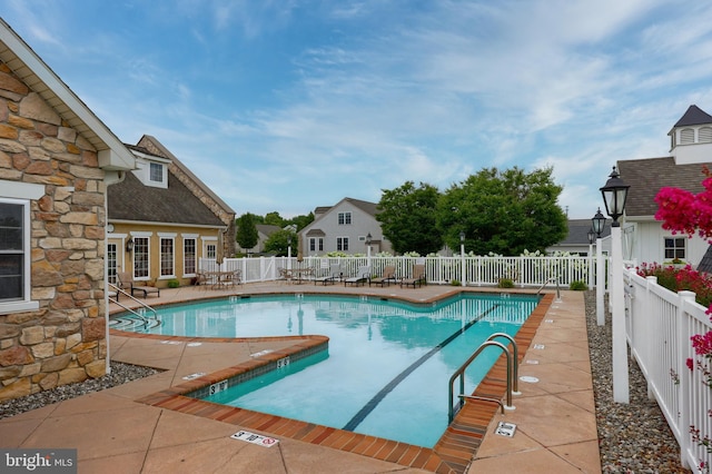 view of pool with a patio area