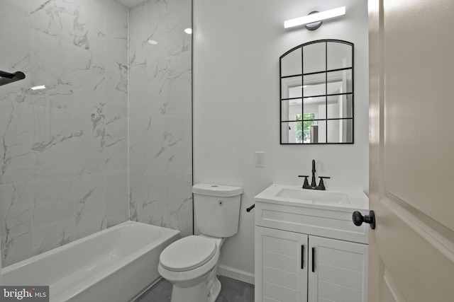 full bathroom with vanity, tiled shower / bath combo, and toilet