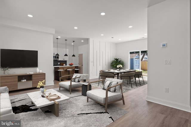 living room with wood-type flooring