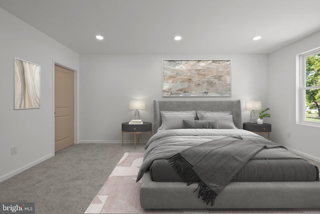 bedroom with light colored carpet