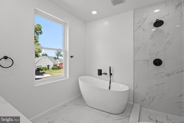 bathroom with plenty of natural light and plus walk in shower