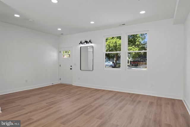 empty room with light wood-type flooring