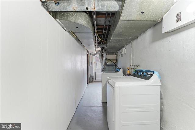 washroom featuring washer and clothes dryer