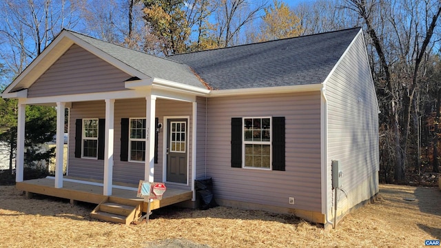 view of front of property featuring covered porch