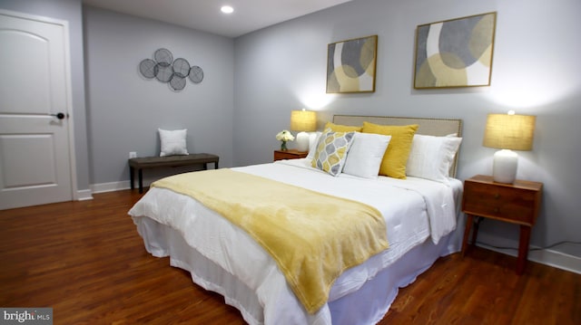 bedroom featuring dark hardwood / wood-style floors