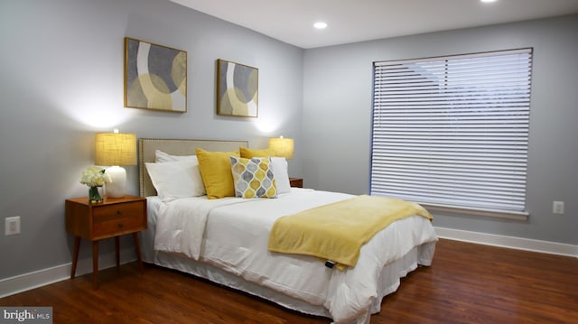 bedroom featuring dark wood-type flooring