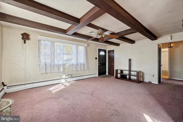 unfurnished living room with carpet, beam ceiling, and ceiling fan