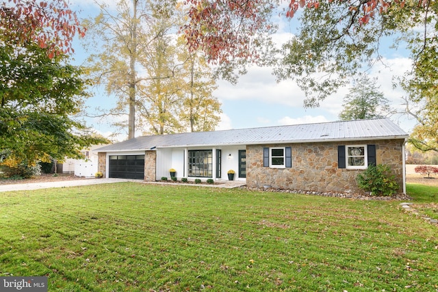 ranch-style house with a garage and a front yard