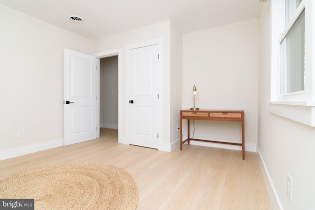 bedroom featuring light wood-type flooring