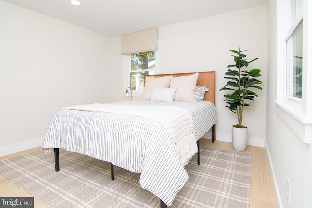 bedroom featuring wood-type flooring