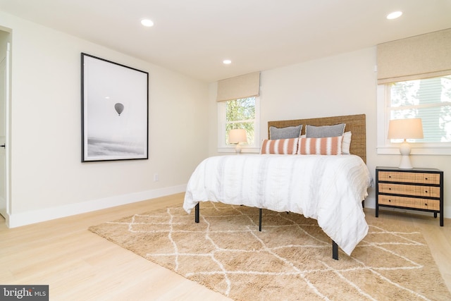 bedroom with wood-type flooring