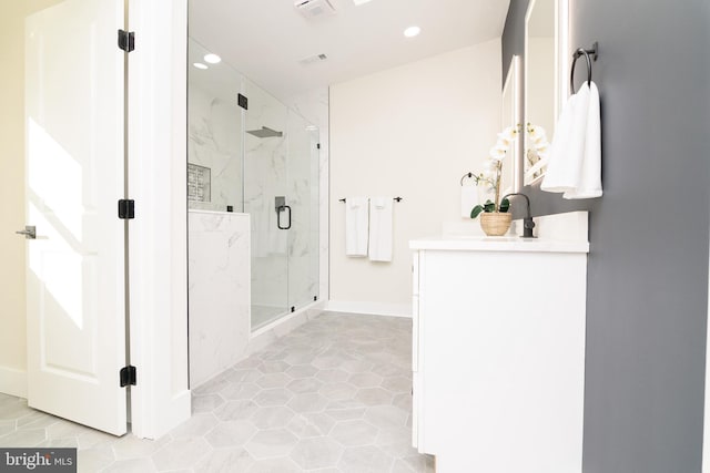 bathroom with vanity, vaulted ceiling, and a shower with shower door