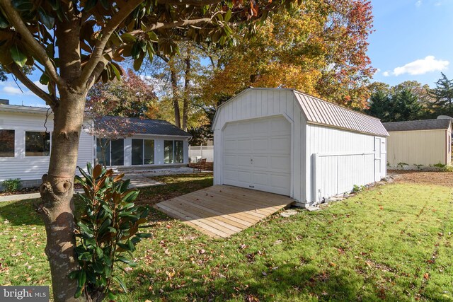 garage with a lawn