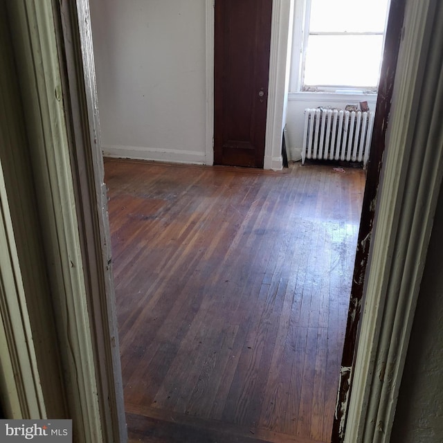 spare room with radiator heating unit