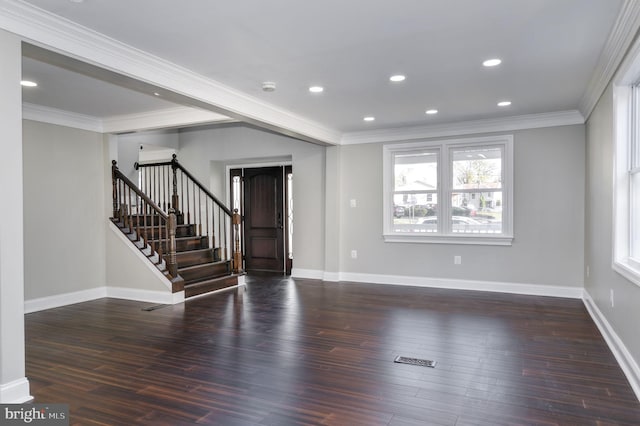 unfurnished living room featuring dark wood-type flooring and ornamental molding