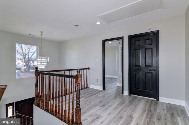 hall featuring light hardwood / wood-style floors