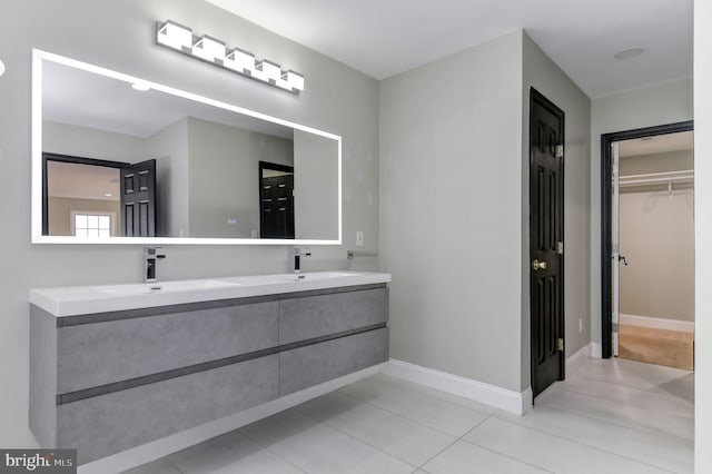 bathroom with vanity and tile patterned floors