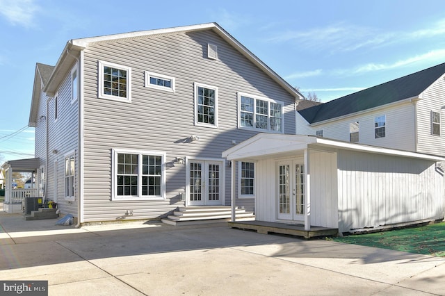 back of property featuring a patio area