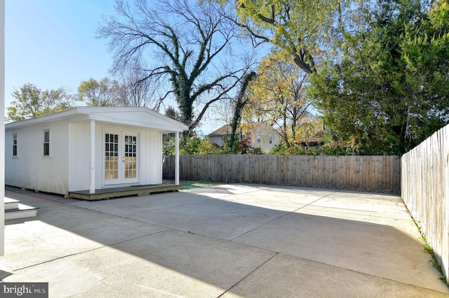 view of patio / terrace with an outbuilding