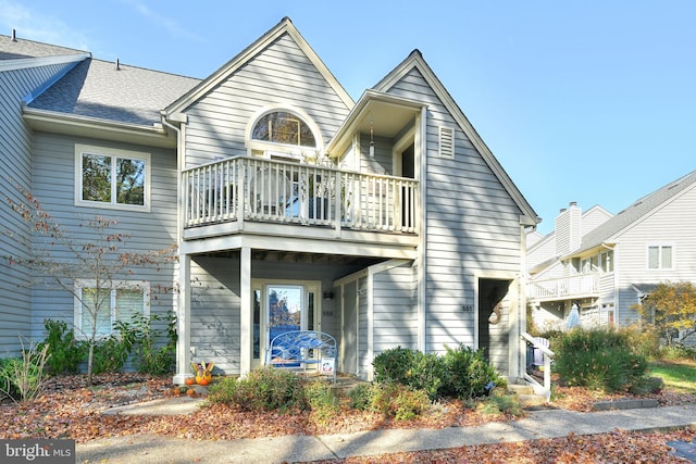 exterior space featuring a balcony