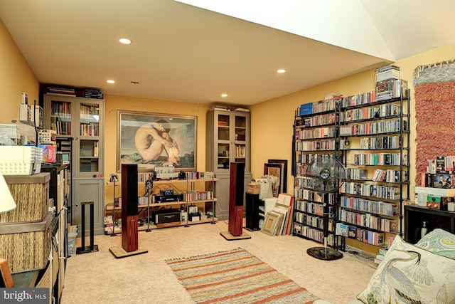 sitting room with light colored carpet