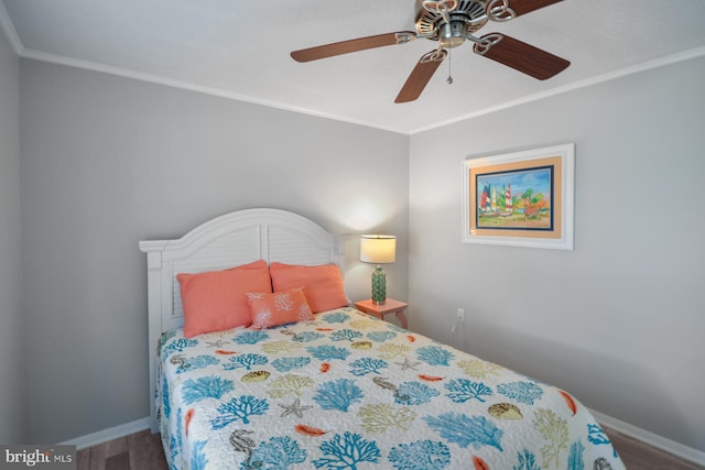 bedroom featuring crown molding and ceiling fan