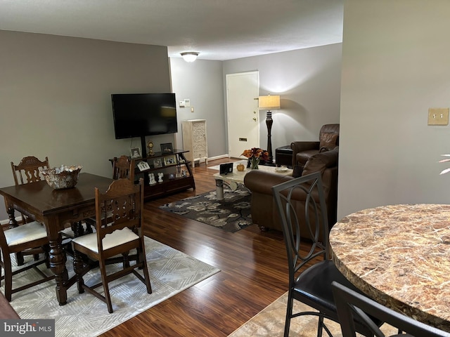 dining area with wood-type flooring