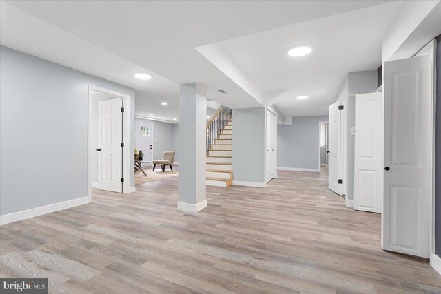 basement with light wood-type flooring