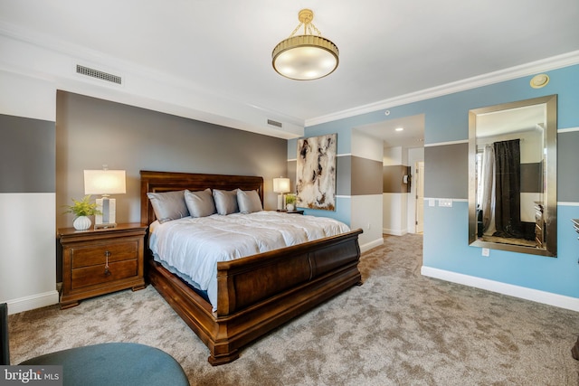 bedroom with light carpet and crown molding