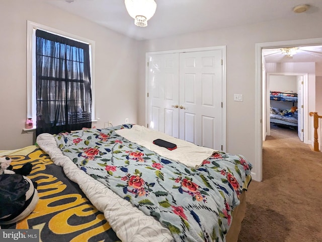 carpeted bedroom with a closet