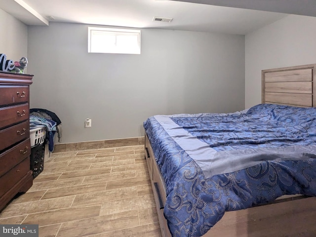 bedroom featuring light hardwood / wood-style flooring