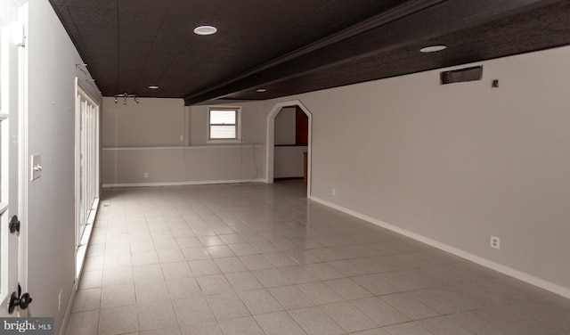 basement with tile patterned floors