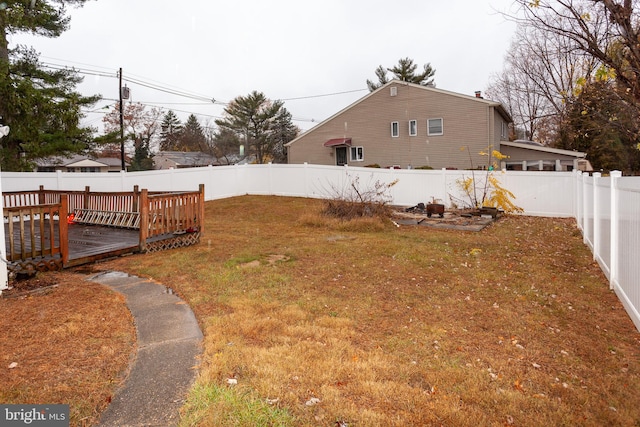 view of yard with a deck