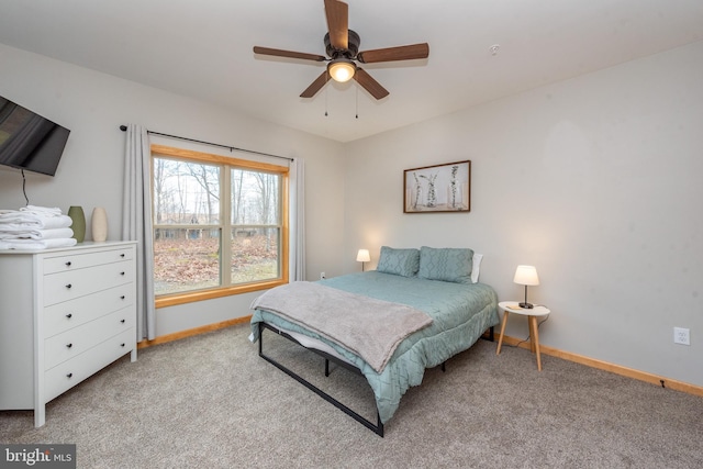 bedroom with light colored carpet and ceiling fan